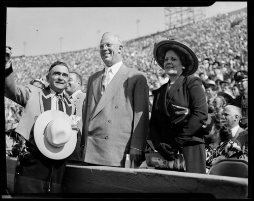 Sheriff Biscailuz, Governor Earl Warren, and Nina Warren at the Sheriff's Rodeo, Los Angeles Coliseum