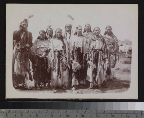 Kiowa dancers in full dress, 1902