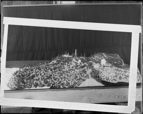 Photogrpah of a model of Mount Wilson Observatory, showing buildings and domes