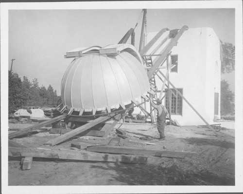 Raising the dome for the Hale Solar Laboratory on ramps for installation, Pasadena