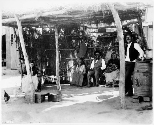 Mexican family under the ramada, San Juan Capistrano