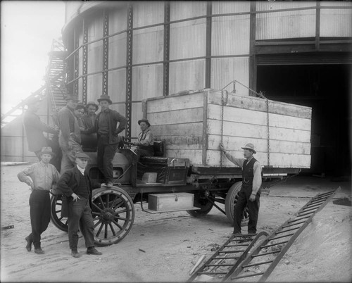 Construction workers and loaded truck at the 100-inch telescope site, Mount Wilson Observatory