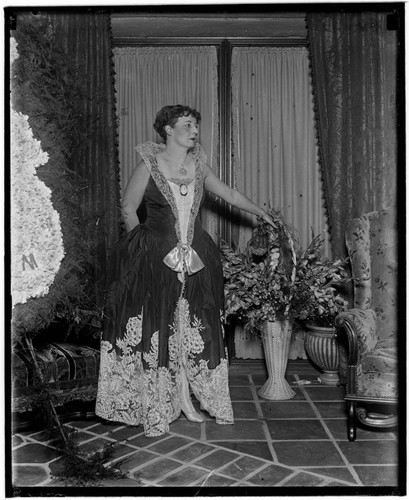 Woman in a ball gown at the Club Casa del Mar, Santa Monica, California