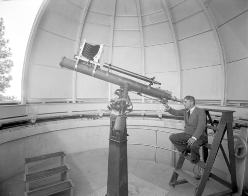 Anthony Wausnack sitting at the 6-inch telescope, Mount Wilson Observatory