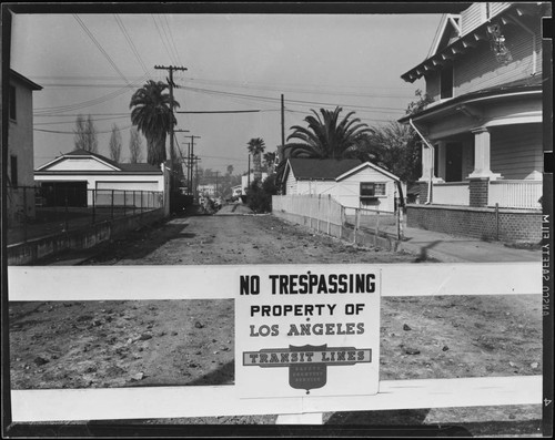 Gate with Los Angeles Transit Lines sign posted