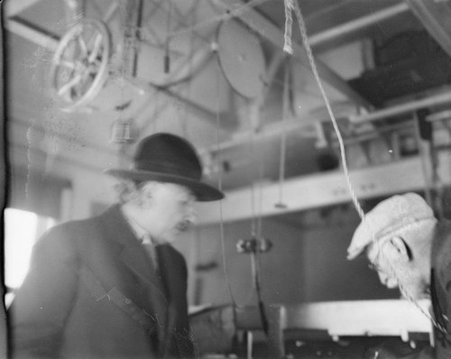 Albert Einstein and Ferdinand Ellerman at the focus of the 150-foot tower telescope, Mount Wilson Observatory