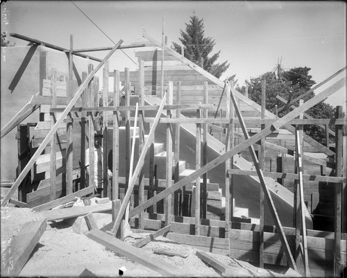 Construction of a foundational pier and stairs as part of the 60-inch telescope building, Mount Wilson Observatory