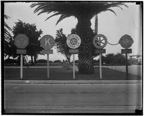 Service club signs and Palisades Park, Santa Monica, California