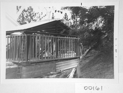 Construction and framing of a computer room addition at the base of the 150-foot tower telescope, Mount Wilson Observatory