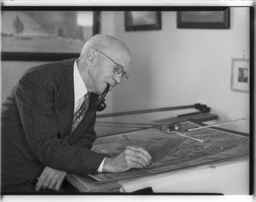 Russell W. Porter at work on a drawing of a 200-inch telescope