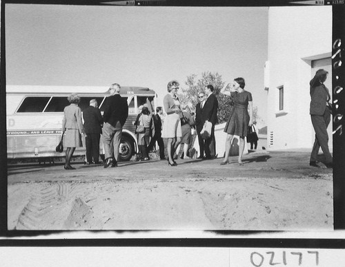 Guests arriving by bus for the dedication of the 60-inch telescope, Palomar Observatory