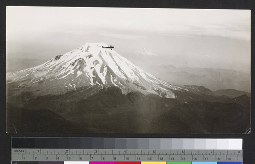 Mount Rainier and airplane. [Variant]