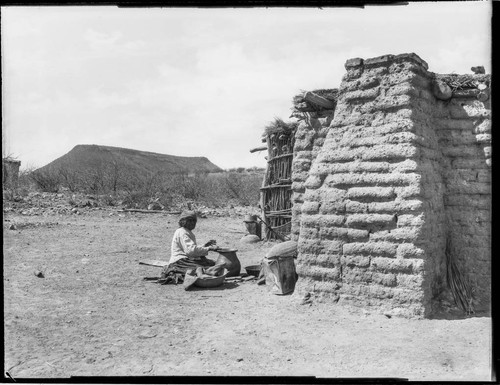 Tohono O'odham woman making pot