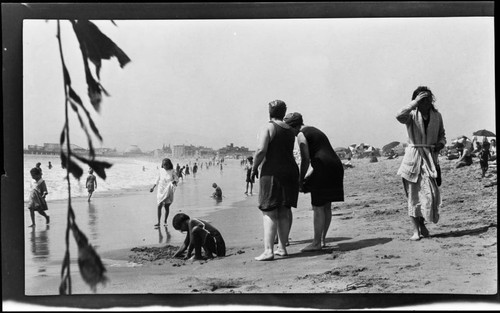 People on the beach and in the surf, Ocean Park, Venice Beach, California