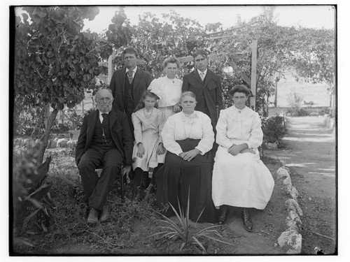 Family portrait in an orchard, Merced Falls, Merced County