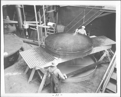 Rinsing off the silver-free 100-inch telescope mirror, Mount Wilson Observatory