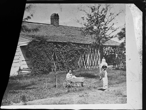 Residence and family of ex-Chief W. P. (William Potter) Ross. Ft. Gibson, Indian Territory