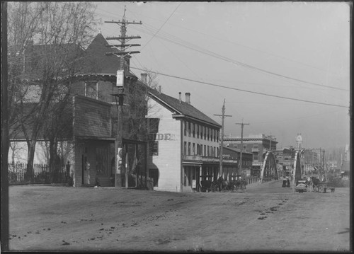 Street view of buildings, storefronts along road leading to old Truckee Bridge, Reno, Nevada