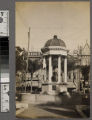 Two men standing on the fountain in Horton Plaza, San Diego, California