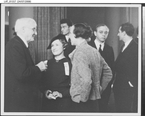 Harry Chandler socializing at his 80th birthday celebration