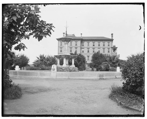 Four story building and fountain