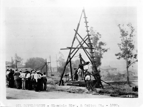 Doheny discovery well showing Mr. Doheny with raised hand