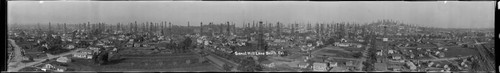 Signal Hill oil field, facing north and east, with some individual derricks labeled. October 11, 1922