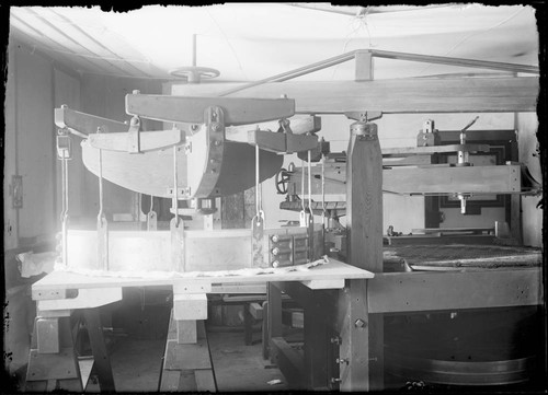 60-inch mirror, suspended after removal from grinding machine