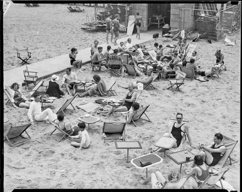 People sitting outdoors at Deauville Club, Santa Monica