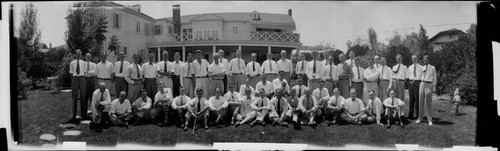 Group portrait of men at a clubhouse