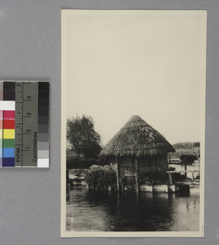 Eel weir and keeper's hut on the Test River, England