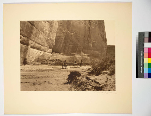 Arizona. Canyon de Chelly. The wonderful Casa Blanca ruin showing the beetling cliff under which it is located