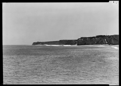 Malibu coastline with buildings on bluffs