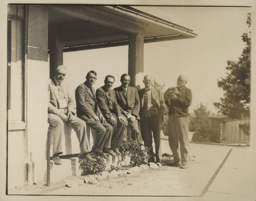 Scientists on the porch at the Mount Wilson Monastery