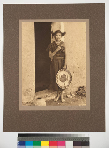 Girl with Plaque, Oraibi, Arizona