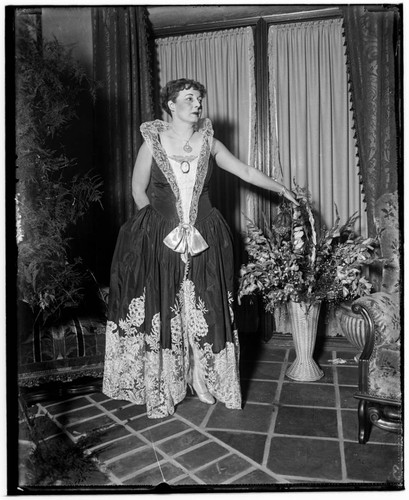 Woman in costume gown at the Club Casa del Mar, Santa Monica, California