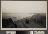 Solitary car on beach road