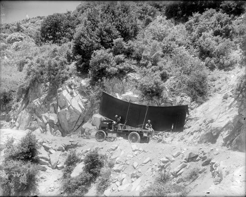 A section of main girder for the 100-inch telescope dome, being driven up the Mount Wilson toll road