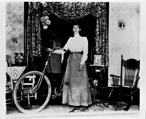 Lady bicyclist at home