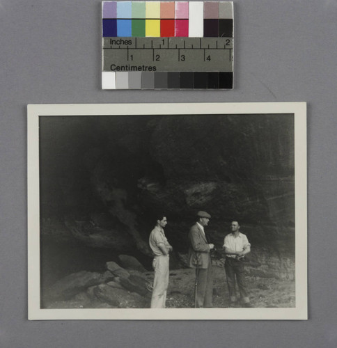 Edwin Powell Hubble and two unidentified men standing in Cave Canyon, Utah