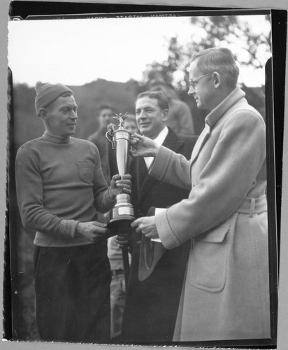 An award being given for ski jumping at the Hollywood Bowl, 2301 North Highland, Los Angeles. 1935