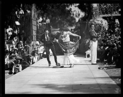 Dancers performing Mexican Hat Dance on stage at Santa Monica High School Fiesta