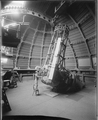 Joseph Hickox standing at the 60-inch telescope, Mount Wilson Observatory