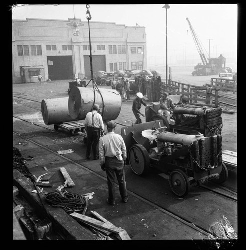 Rolls of newsprint unloaded at the dock, Port of Los Angeles