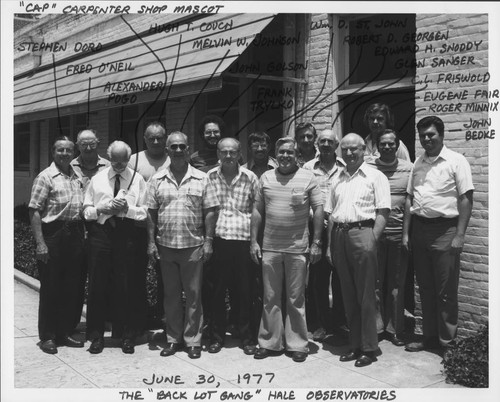 Group photograph of Hale Observatories' support staff, posing outside of the Pasadena office building