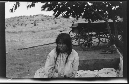 Pueblo woman making bread, "Piki." First Mesa