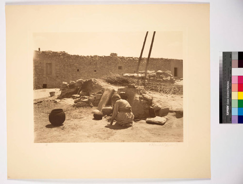 Old Hopi woman cooking dinner