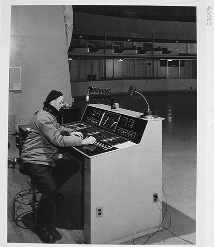 Bill Baum seated at the control desk for the 200-inch telescope, Palomar Observatory