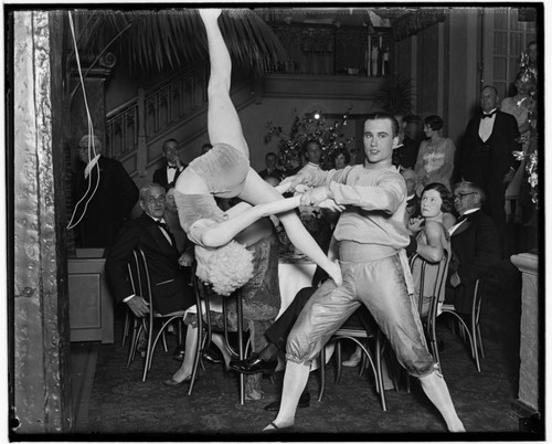 Acrobats performing at the Club Casa del Mar, Santa Monica, California