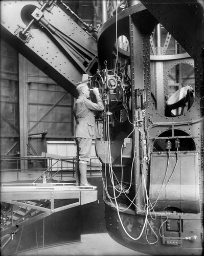 Francis Pease at the cassegrain focus of the 100-inch telescope, Mount Wilson Observatory